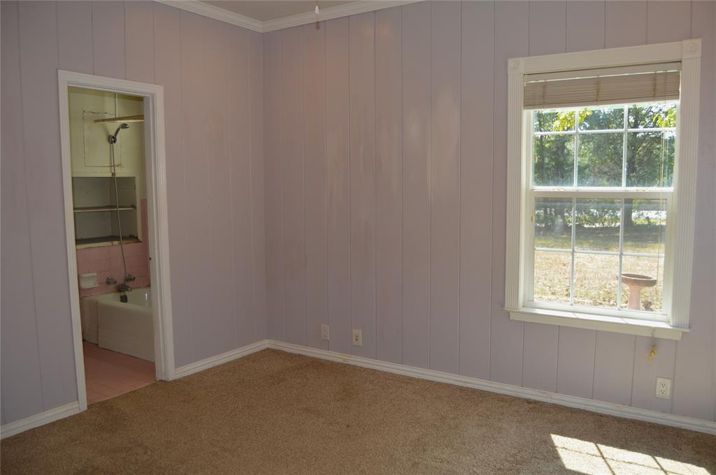 4120 Interstate 30 Campbell, TX 75422 - Photo 14 of 36 an empty room and a window