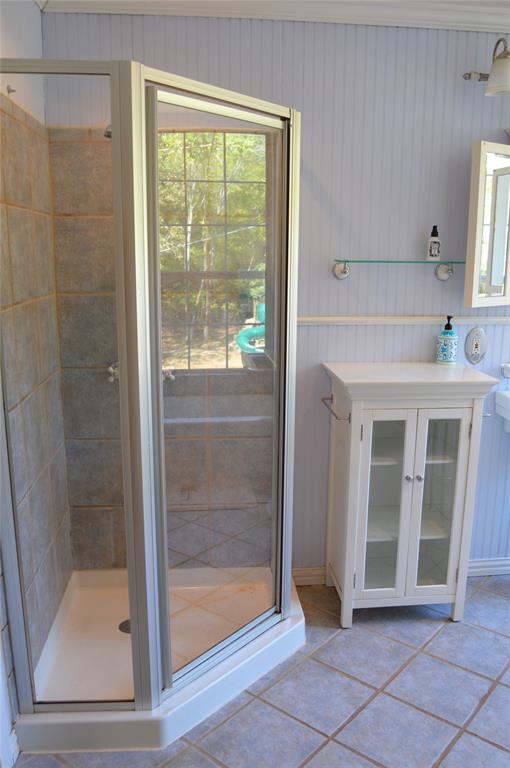 4120 Interstate 30 Campbell, TX 75422 - Photo 21 of 36 a view of a bathroom with a glass door