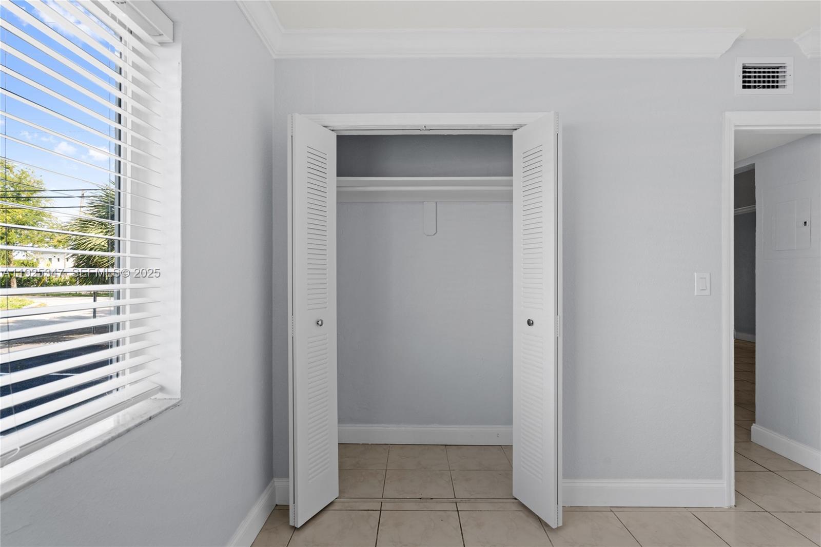 980 Northeast 170th Street, Unit 118 North Miami Beach, FL 33162 - Photo 14 of 32 a view of an empty room