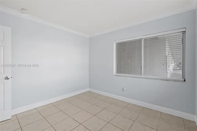 a view of a room that has a window in it