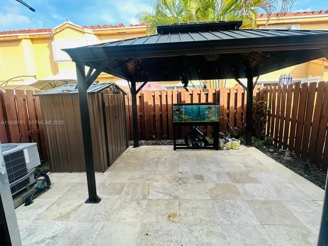 a view of outdoor space with a patio