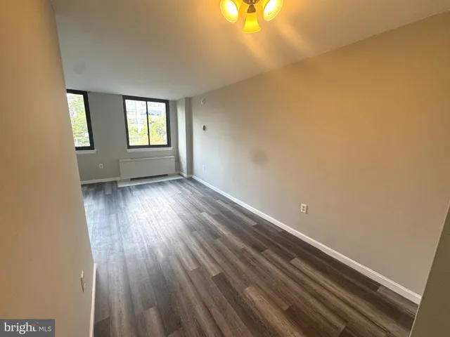 a view of an empty room and window