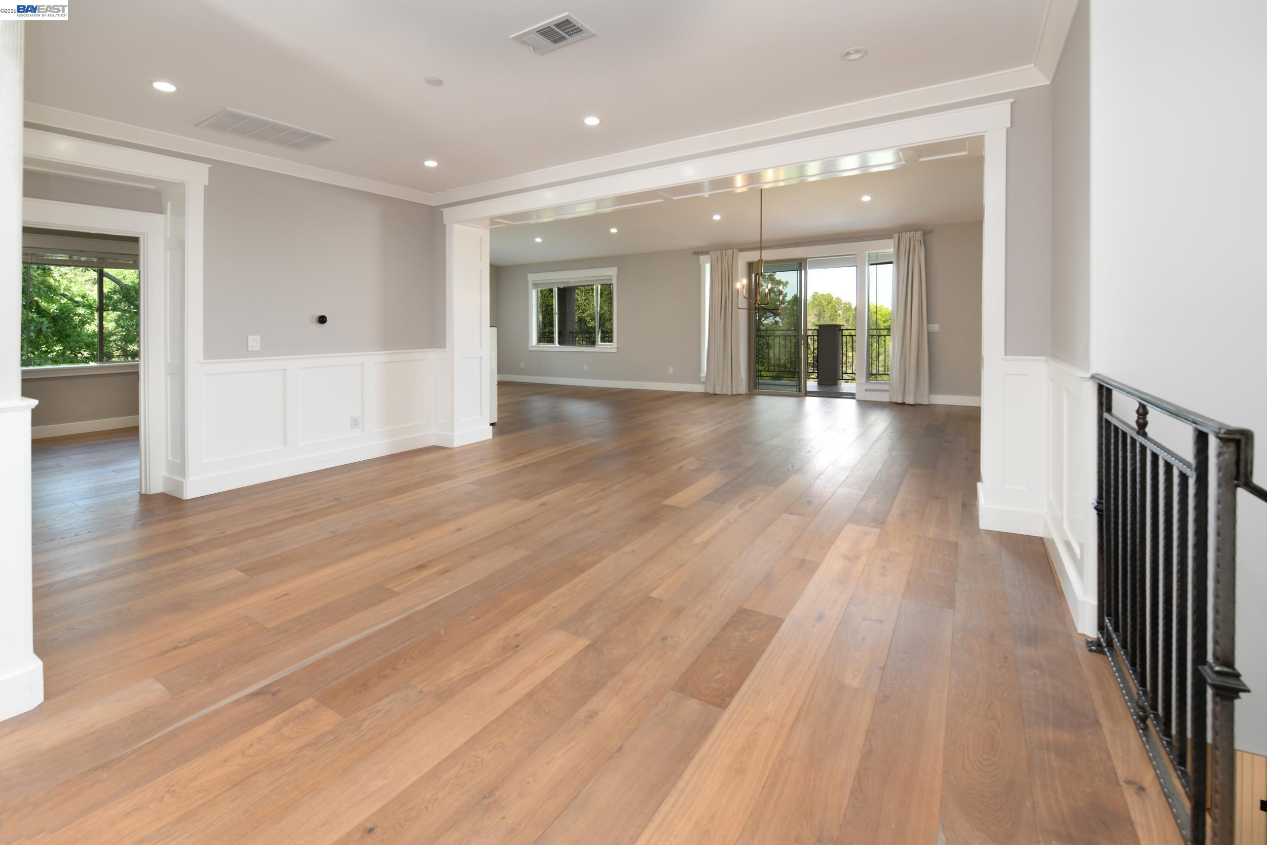 1516 Pleasant Hill Road Lafayette, CA 94549 - Photo 8 of 38 wooden floor in an empty room with a window