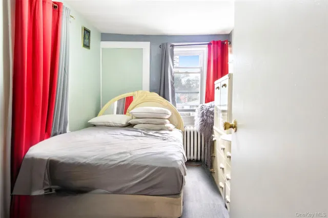 a kitchen with a refrigerator and a stove top oven