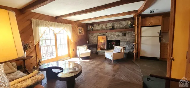 a kitchen with refrigerator and stove