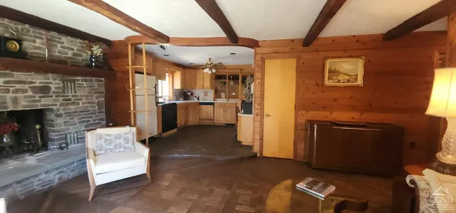 a bedroom with a bed and a mirror