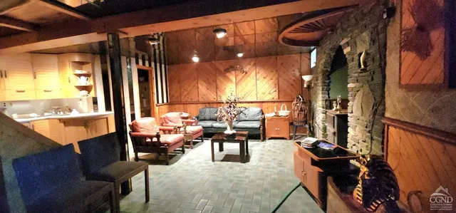 a kitchen with a sink stove and microwave