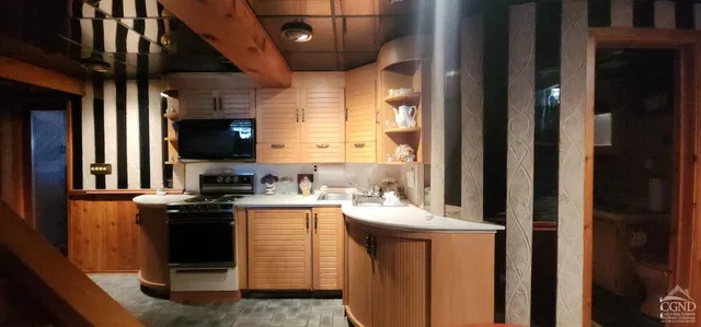 a view of a yard with chairs