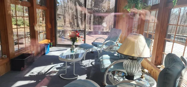 a living room filled with furniture