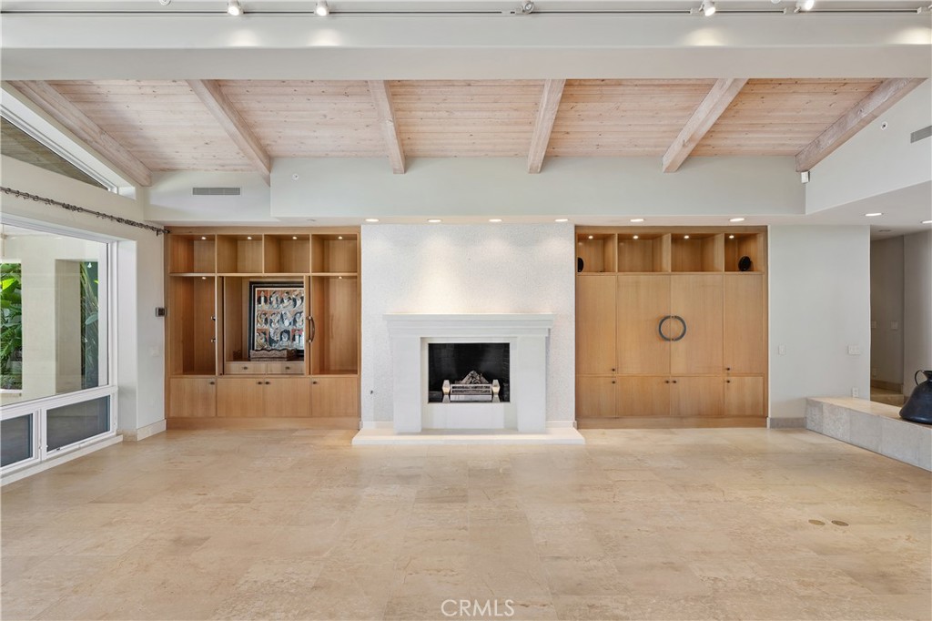 6533 Lago Lindo Rancho Santa Fe, CA 92067 - Photo 19 of 57 a view of a livingroom with a fireplace