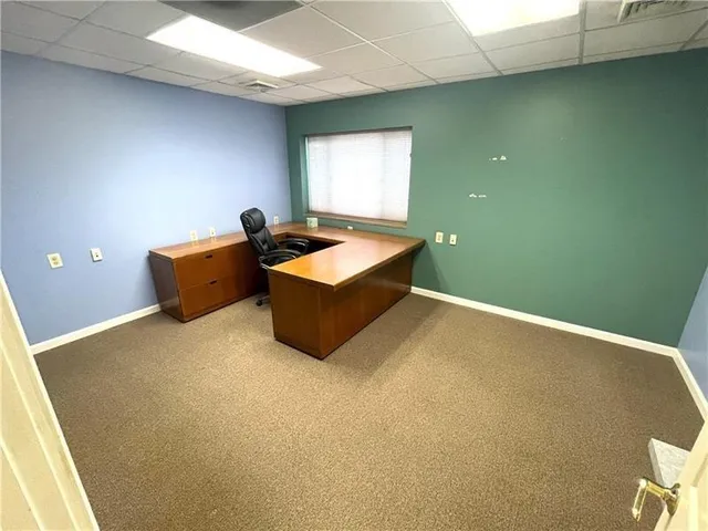 a room with furniture and window