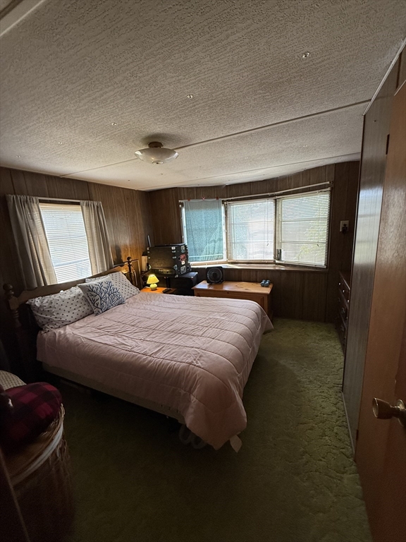 3132 Cranberry Highway, Unit 59 Wareham, MA 02538 - Photo 12 of 22 a bedroom with a bed and window