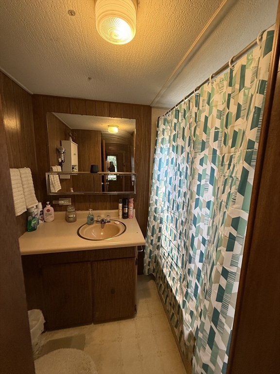 3132 Cranberry Highway, Unit 59 Wareham, MA 02538 - Photo 14 of 22 a bathroom with a sink and a mirror