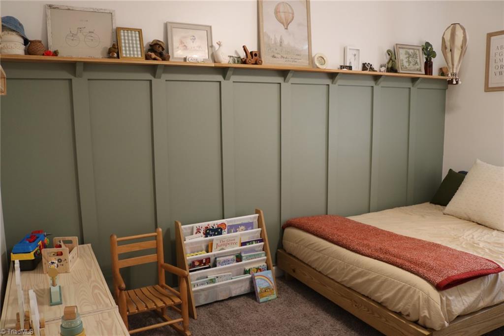 8455 Jefferson Church Road Rural Hall, NC 27045 - Photo 25 of 31 Accent wall with beautiful shelf in 3rd bedroom
