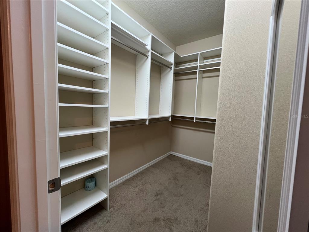 9515 Southwest 76th Street Ocala, FL 34481 - Photo 24 of 55 a view of an empty walk in closet