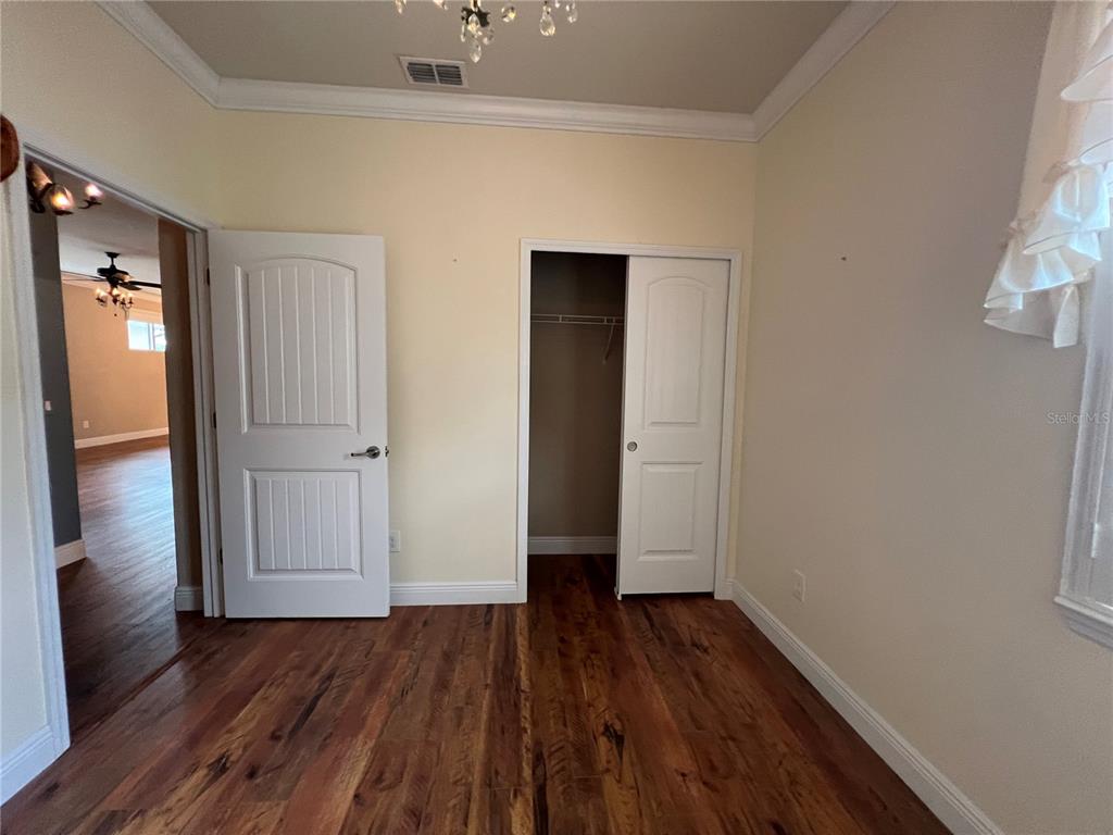 9515 Southwest 76th Street Ocala, FL 34481 - Photo 38 of 55 wooden floor in an empty room