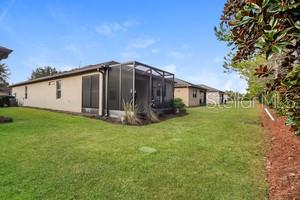 9515 Southwest 76th Street Ocala, FL 34481 - Photo 53 of 55 a view of a house with backyard and garden