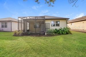9515 Southwest 76th Street Ocala, FL 34481 - Photo 54 of 55 a view of a back yard of the house