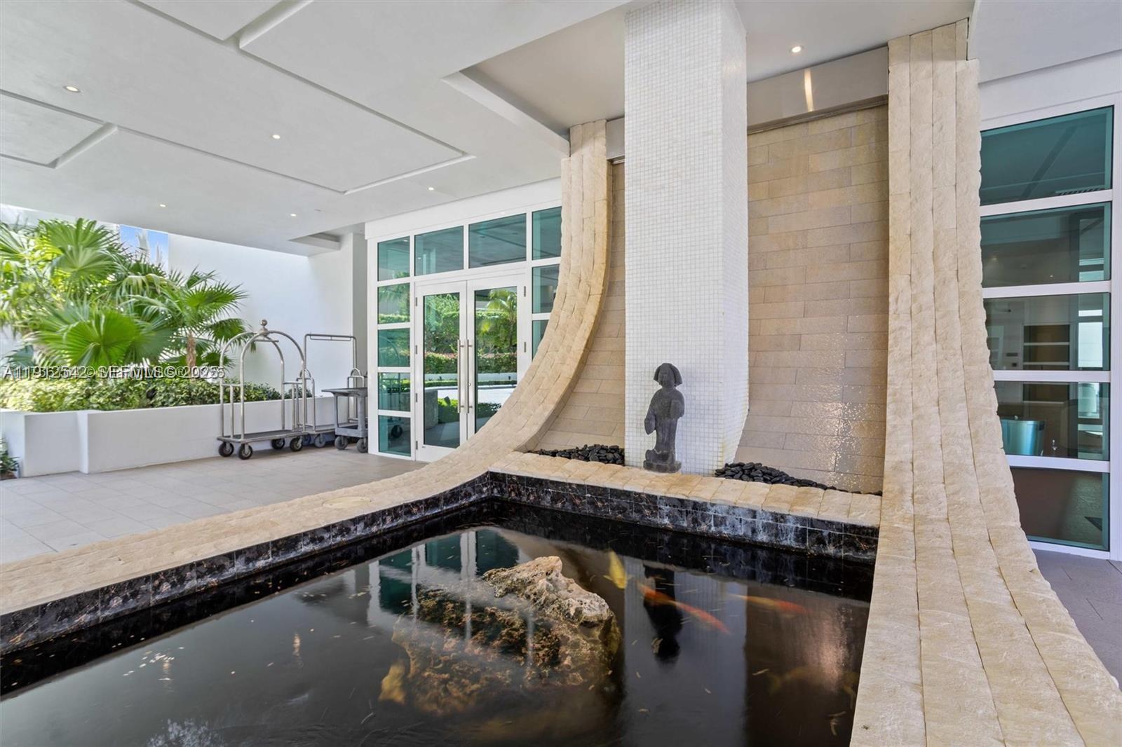 900 Brickell Key Boulevard, Unit 1502 Miami, FL 33131 - Photo 11 of 33 a view of balcony with furniture