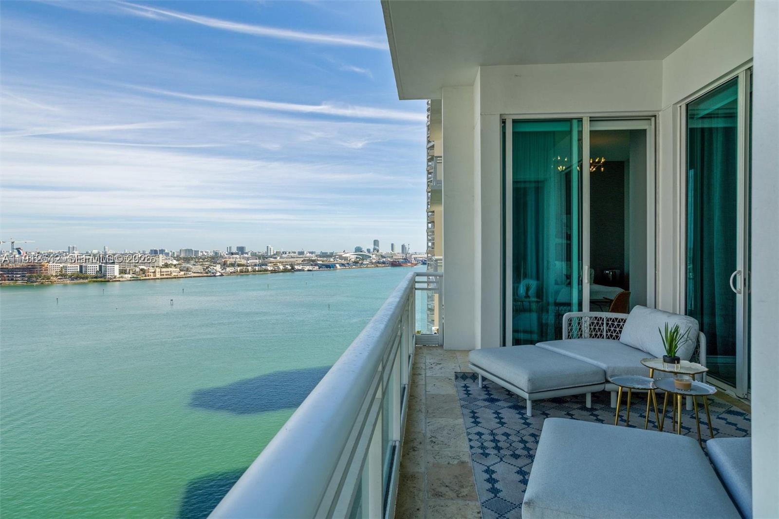 900 Brickell Key Boulevard, Unit 1502 Miami, FL 33131 - Photo 17 of 33 a view of balcony with furniture and garden