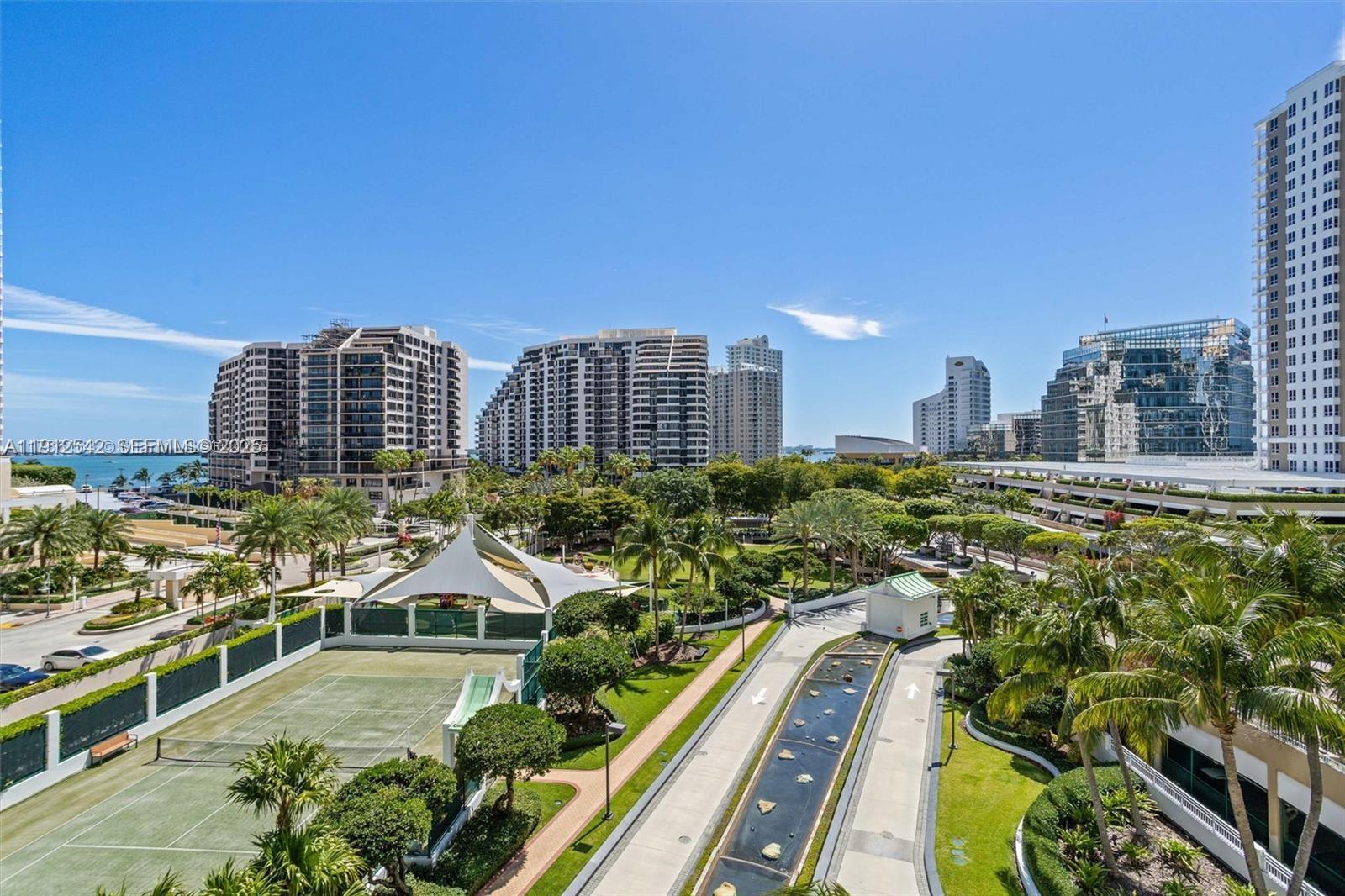 900 Brickell Key Boulevard, Unit 1502 Miami, FL 33131 - Photo 5 of 33 a view of a city with tall buildings