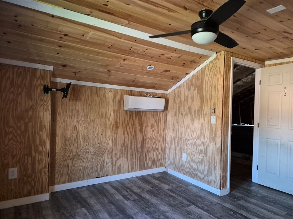 112 Overbrook Street Pickens, SC 29671 - Photo 13 of 19 This versatile room features textured walls, a sloped ceiling, and durable flooring, offering a cozy retreat.