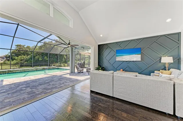 a room with furniture and a flat screen tv