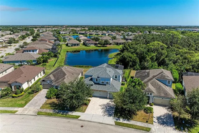 an aerial view of a house with a garden