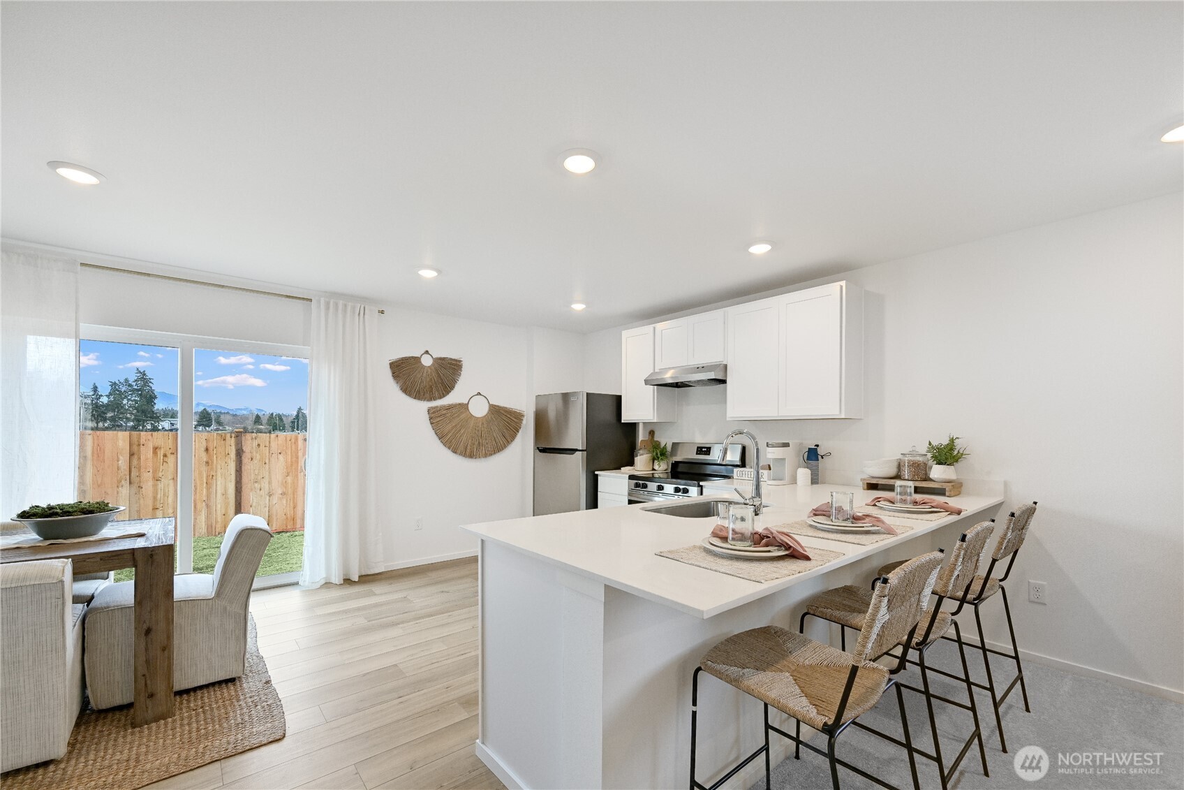 83 Moonshadow Lane Sequim, WA 98382 - Photo 3 of 22 a view of a dining room with furniture window and outside view