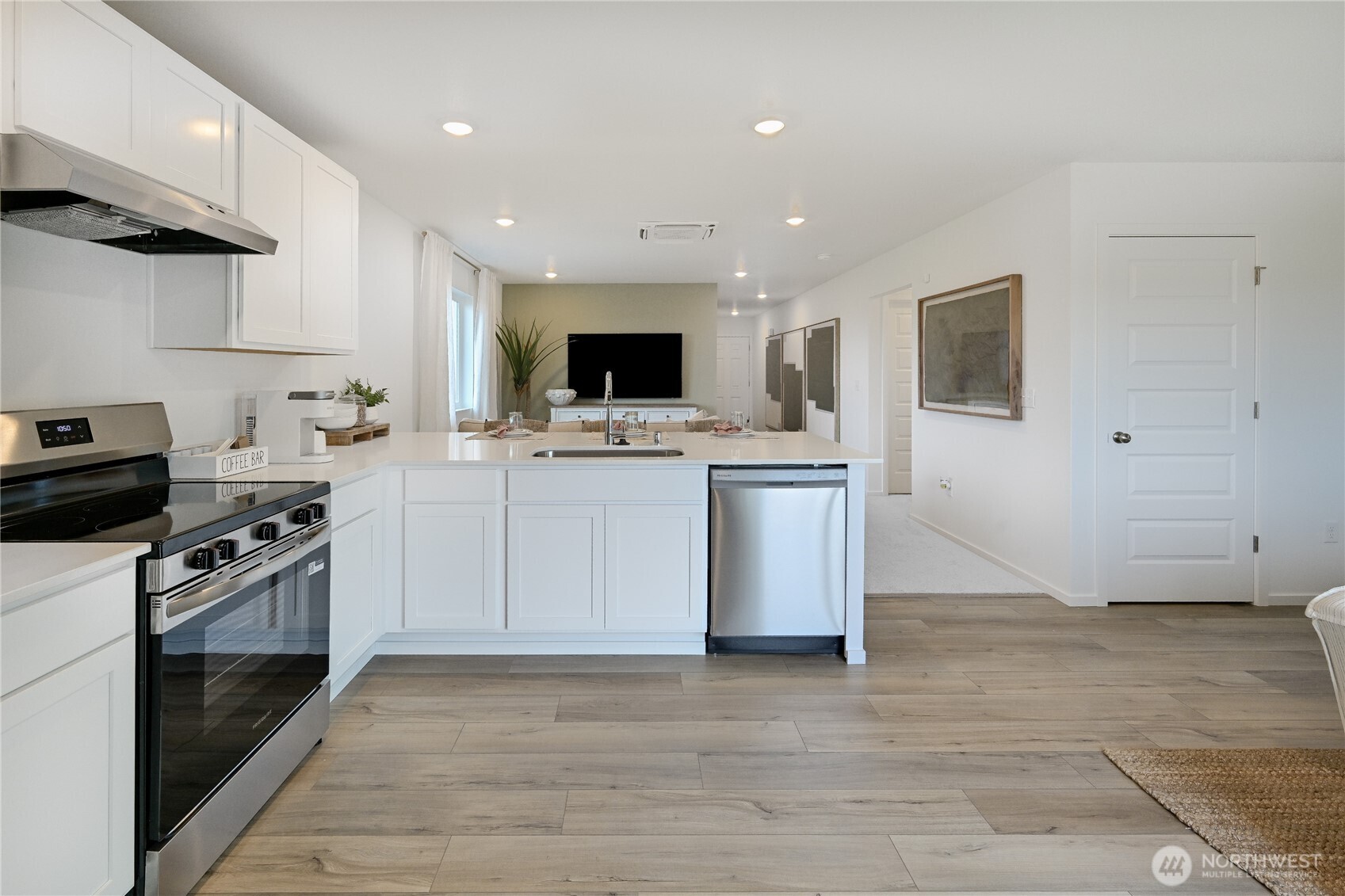 83 Moonshadow Lane Sequim, WA 98382 - Photo 6 of 22 a kitchen with a sink stainless steel appliances and cabinets