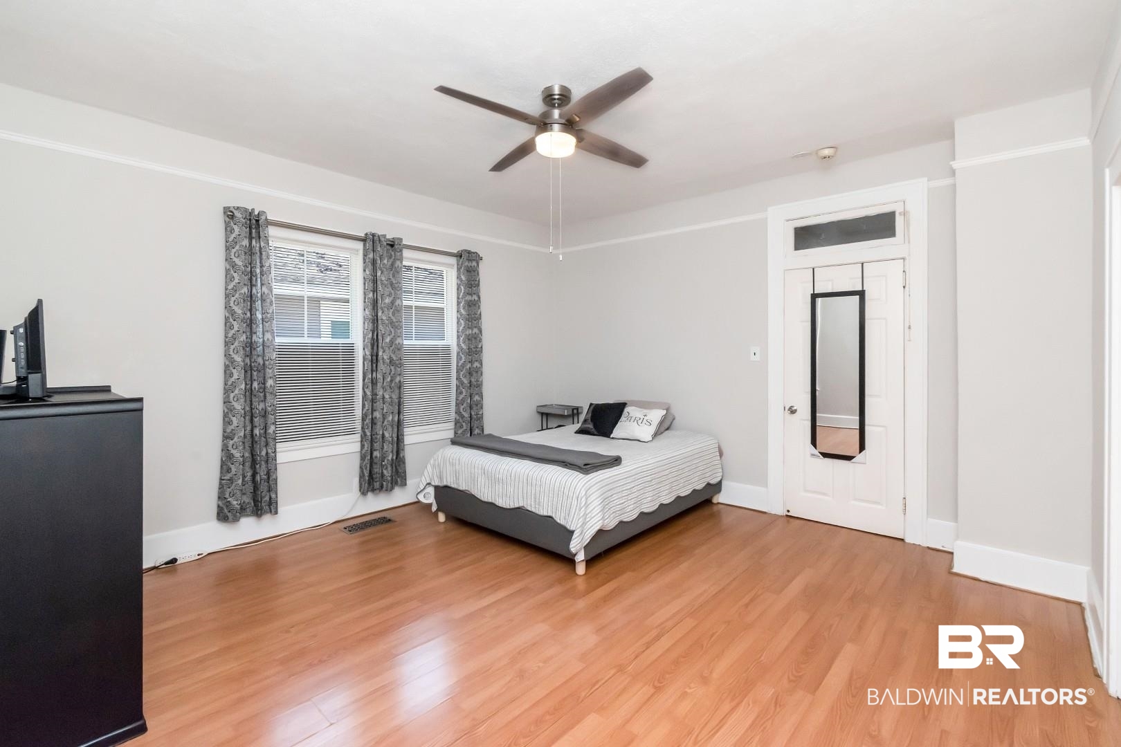 653 Cherokee Street Mobile, AL 36606 - Photo 8 of 22 Bedroom featuring light wood-style flooring and ceiling fan