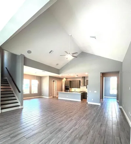 a spacious bathroom with a double vanity sink and a mirror