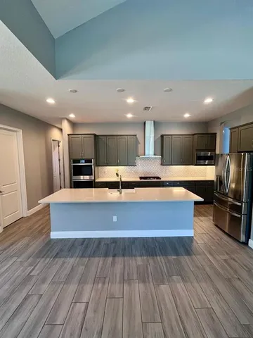 a bathroom with a sink toilet tub and shower