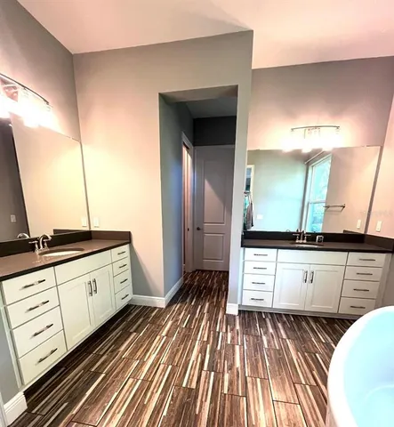 a utility room with cabinets