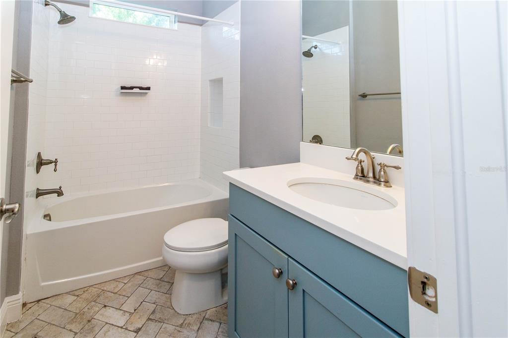 5901 Nature Ridge Lane Lithia, FL 33547 - Photo 30 of 54 a bathroom with a sink toilet tub and shower