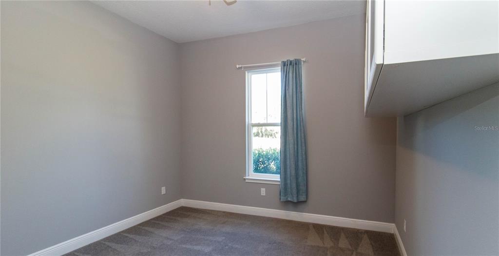 5901 Nature Ridge Lane Lithia, FL 33547 - Photo 32 of 51 a view of an empty room with a window