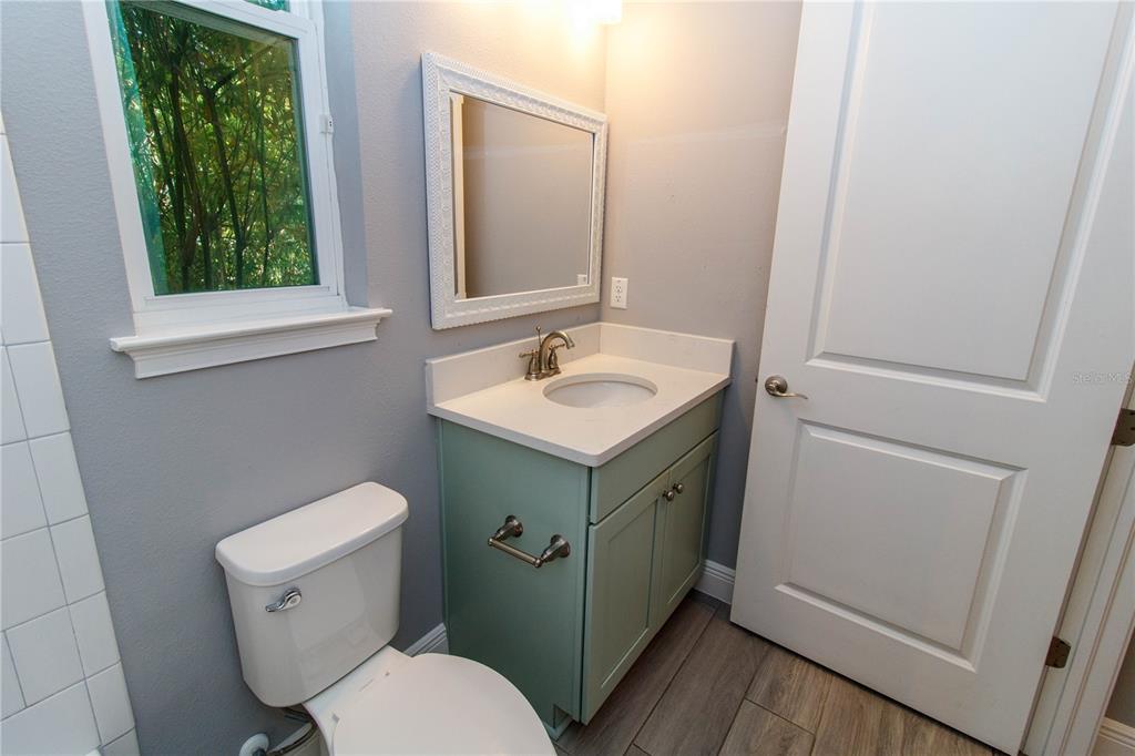 5901 Nature Ridge Lane Lithia, FL 33547 - Photo 34 of 51 a bathroom with a sink and a toilet