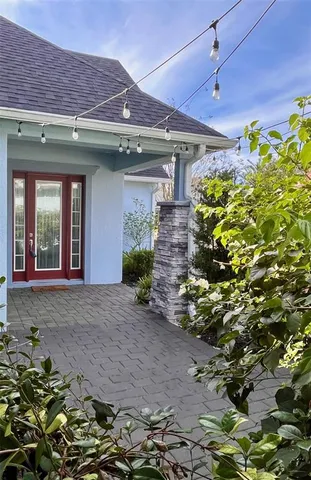 a kitchen with cabinets and window