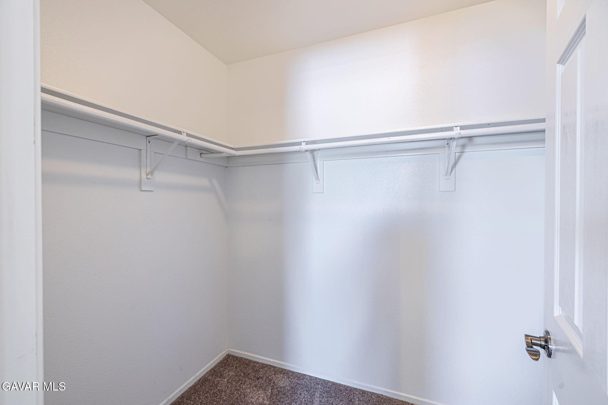 2400 Sunset Ridge Drive Rosamond, CA 93560 - Photo 18 of 34 a view of an empty walk in closet