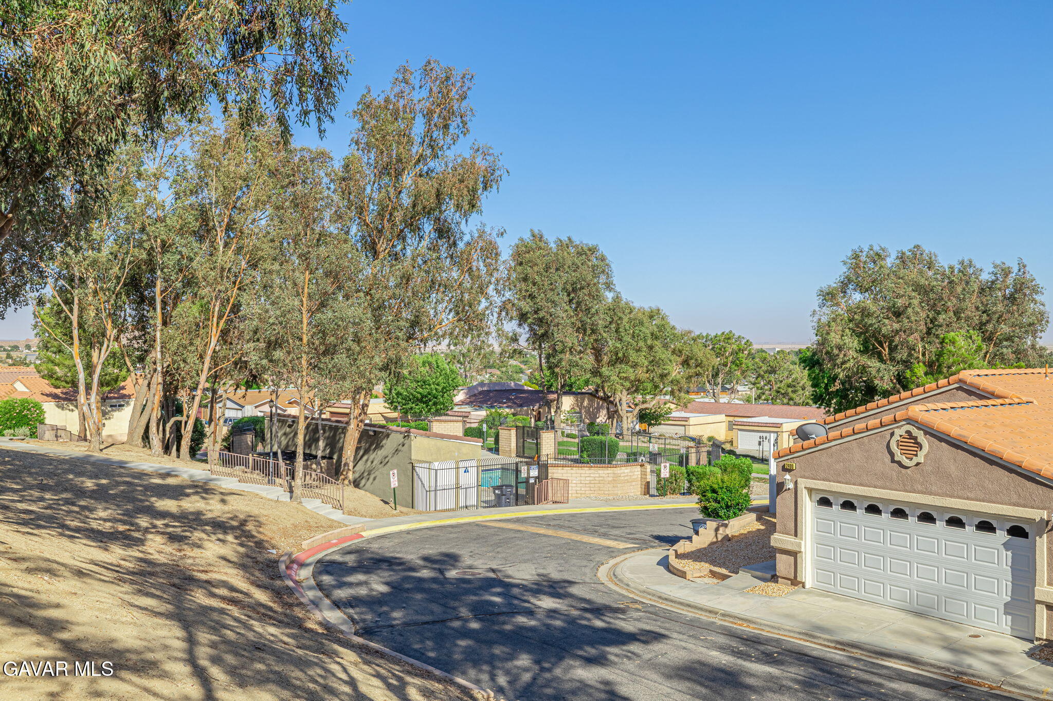 2400 Sunset Ridge Drive Rosamond, CA 93560 - Photo 24 of 34 a view of a street with houses on both side