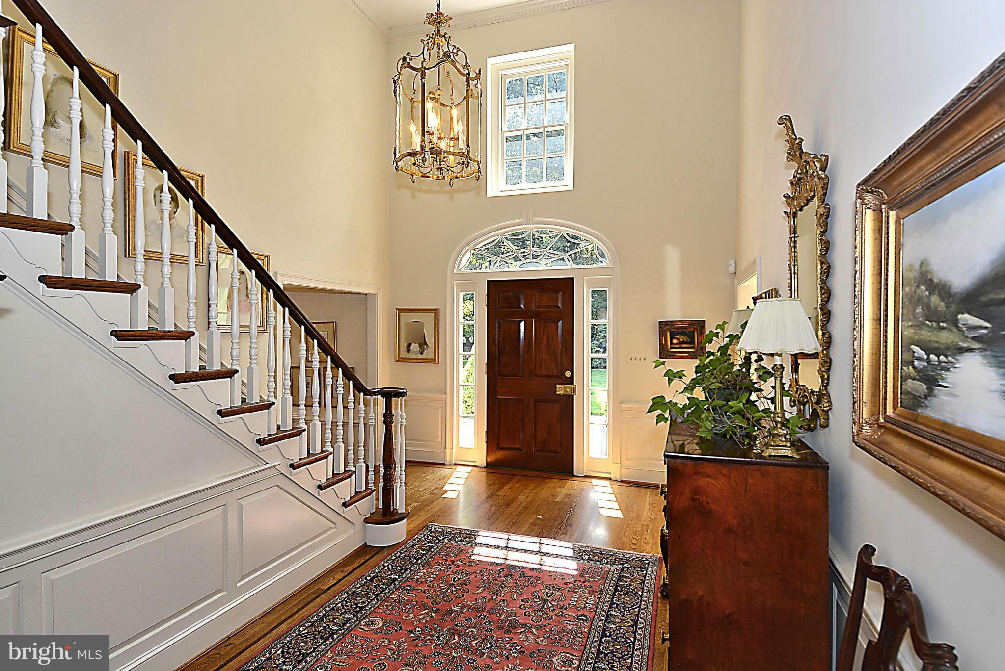 8741 Persimmon Tree Road Potomac, MD 20854 - Photo 2 of 30 Impressive two-story foyer w/ detailed mouldings
