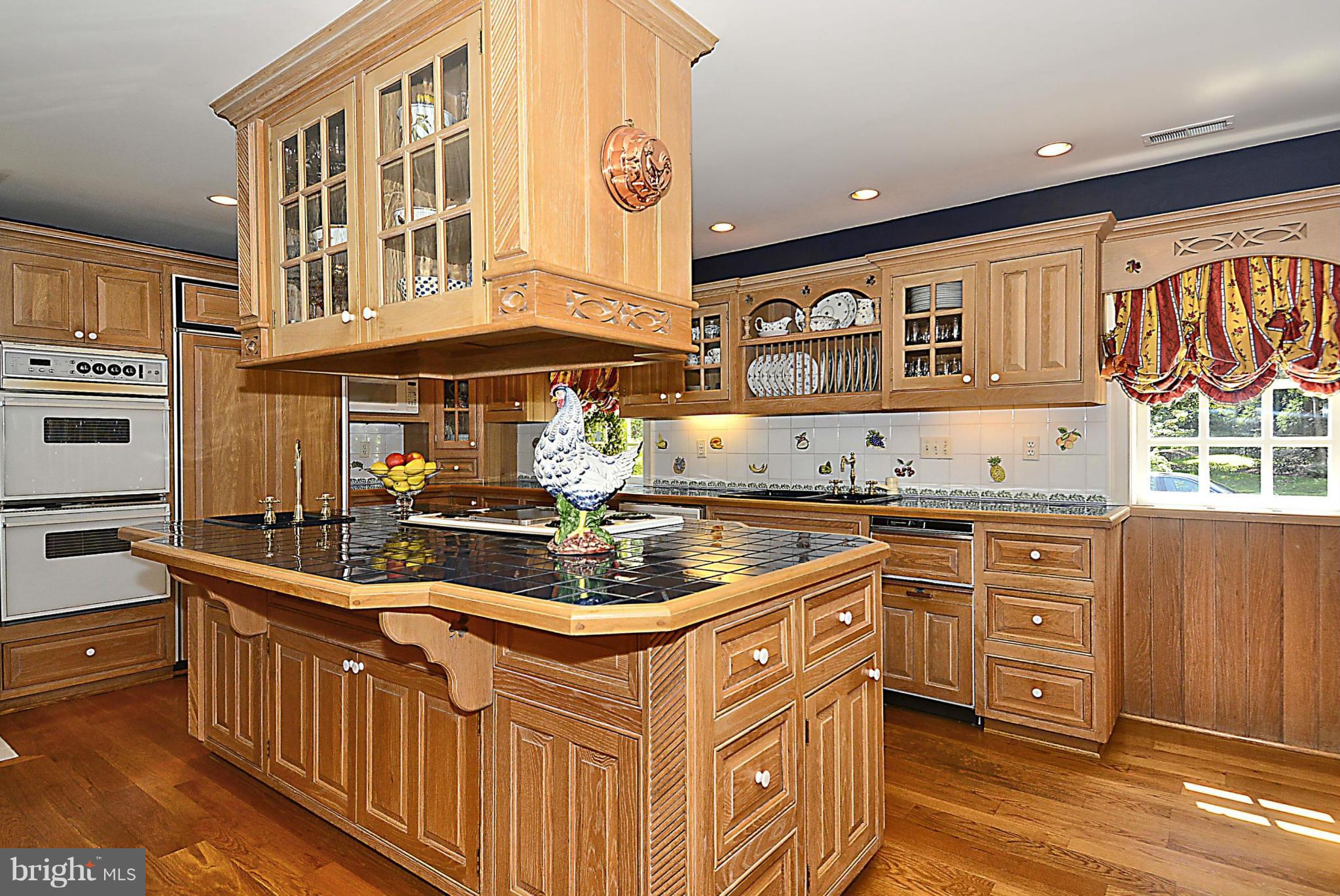 8741 Persimmon Tree Road Potomac, MD 20854 - Photo 11 of 30 Gourmet kitchen w/ center island