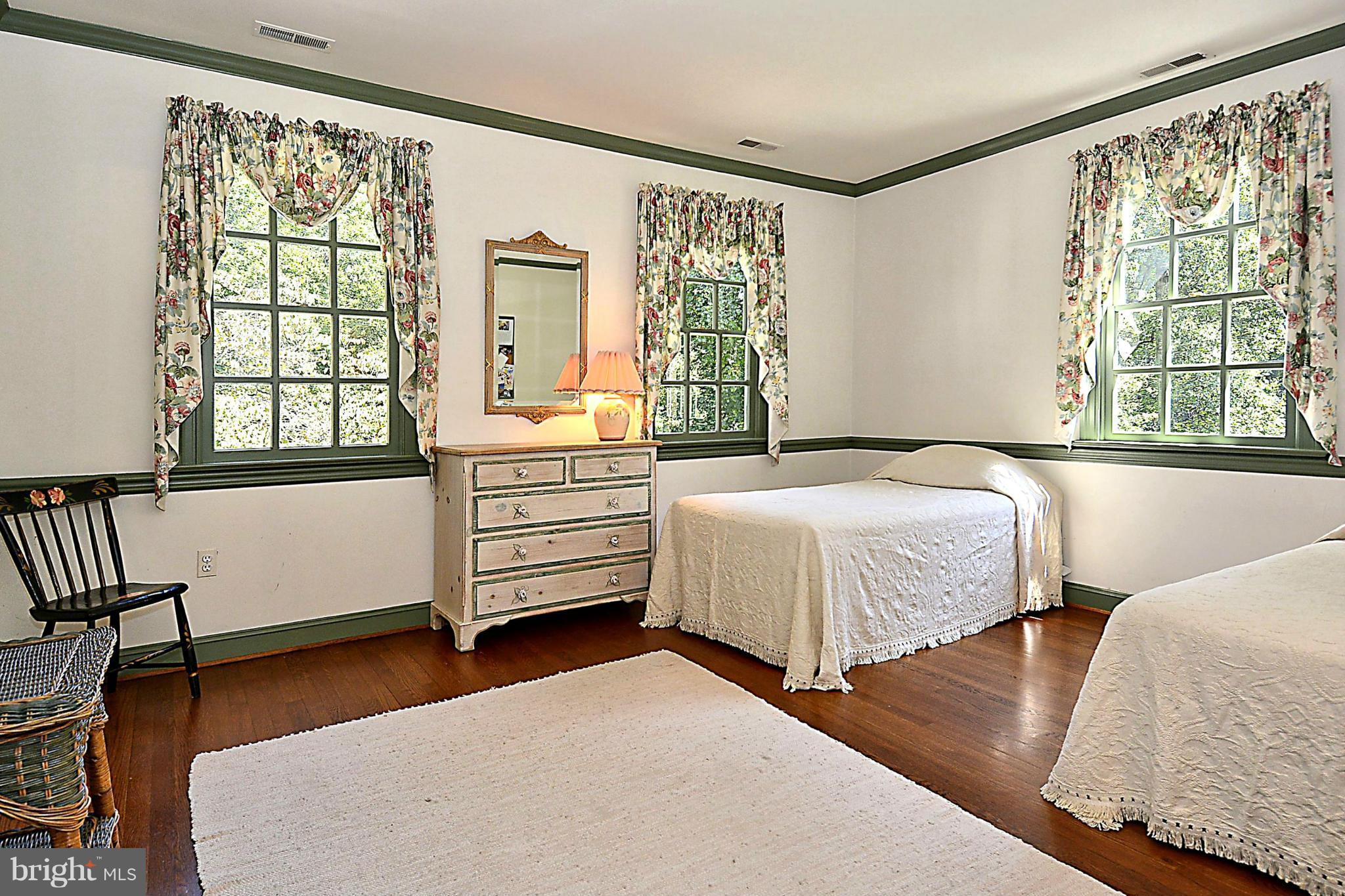 8741 Persimmon Tree Road Potomac, MD 20854 - Photo 18 of 30 En-suite bedroom #3 w/ hardwood floors