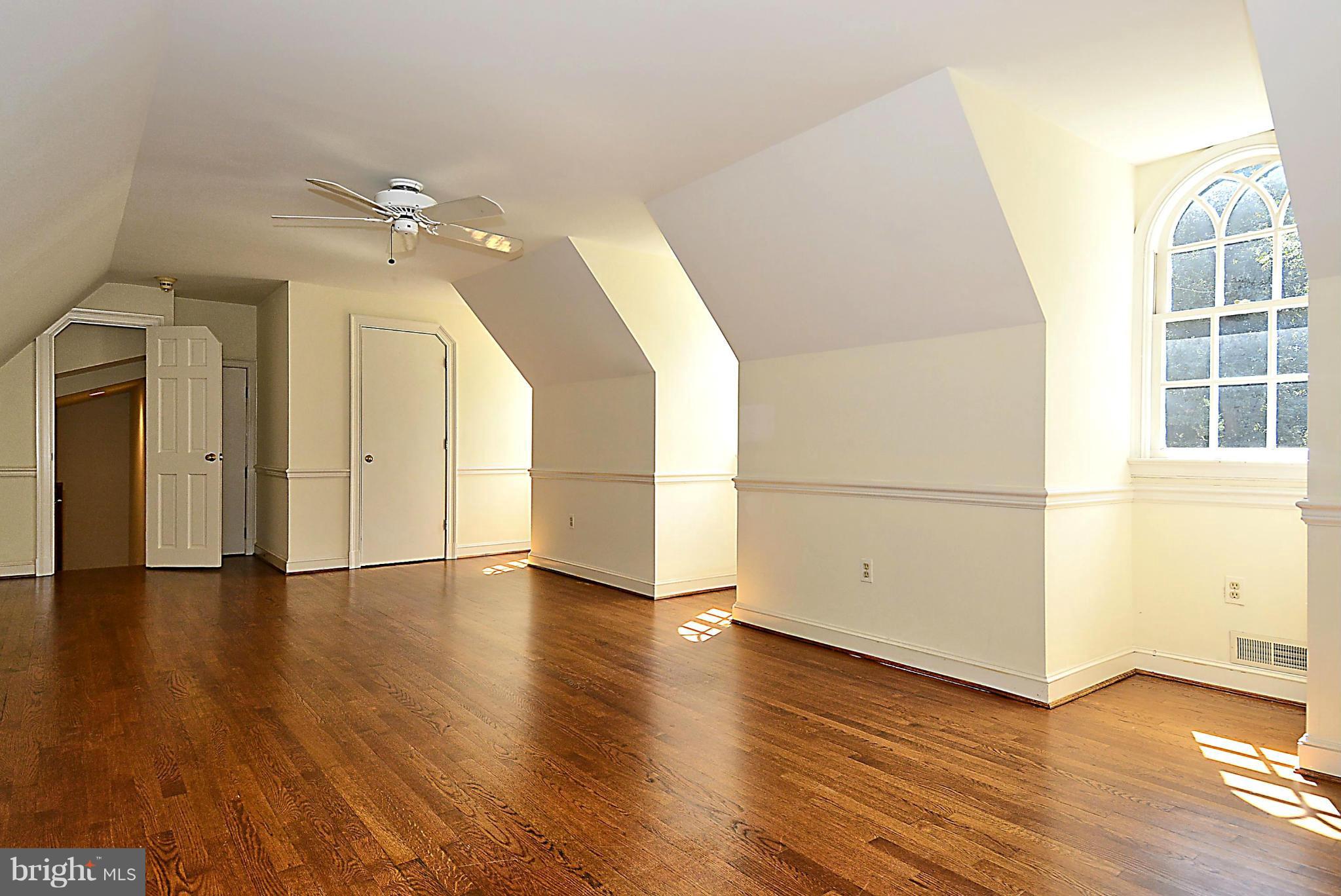 8741 Persimmon Tree Road Potomac, MD 20854 - Photo 21 of 30 Upper level Bedroom #6 or loft w/ hardwood floors