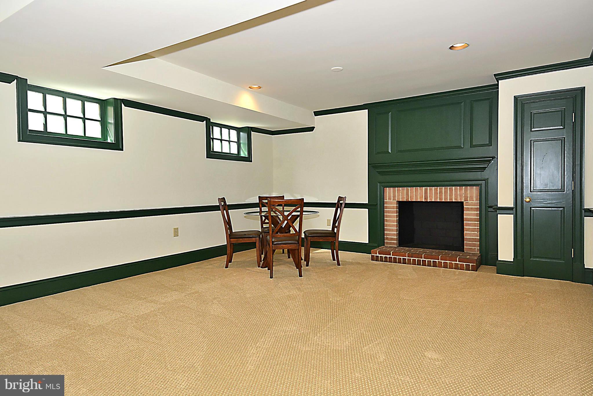 8741 Persimmon Tree Road Potomac, MD 20854 - Photo 25 of 30 Lower level den/exercise room w/ FP