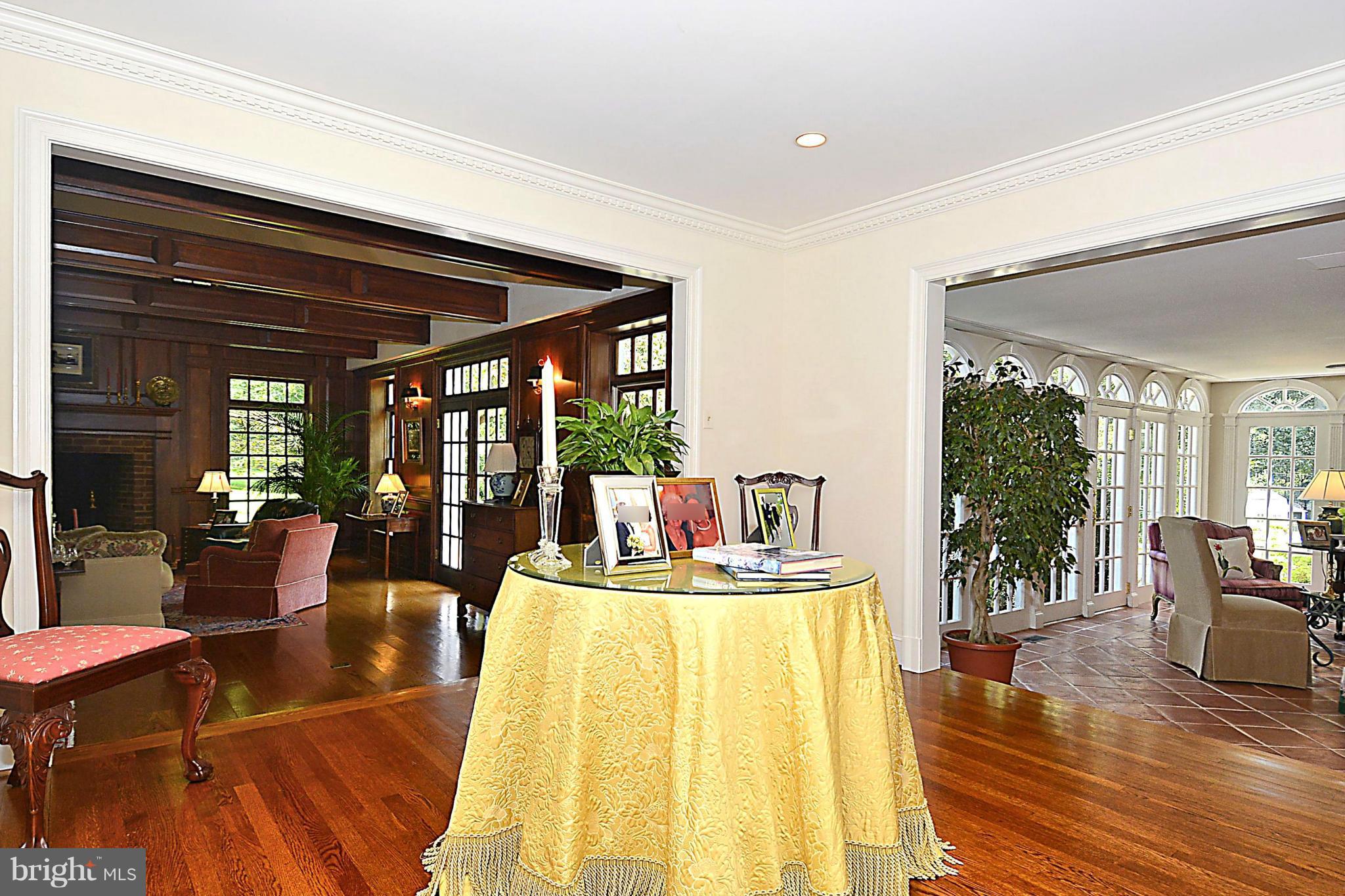 8741 Persimmon Tree Road Potomac, MD 20854 - Photo 4 of 30 Reception hall between foyer, FL Rm