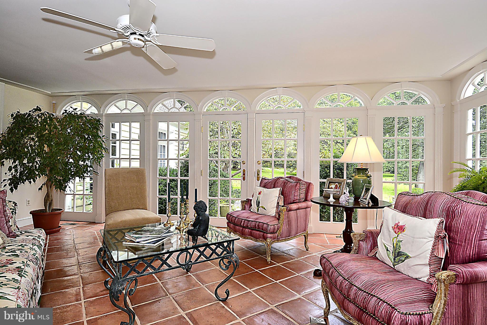 8741 Persimmon Tree Road Potomac, MD 20854 - Photo 9 of 30 Florida room w/ wall-wall atrium windows