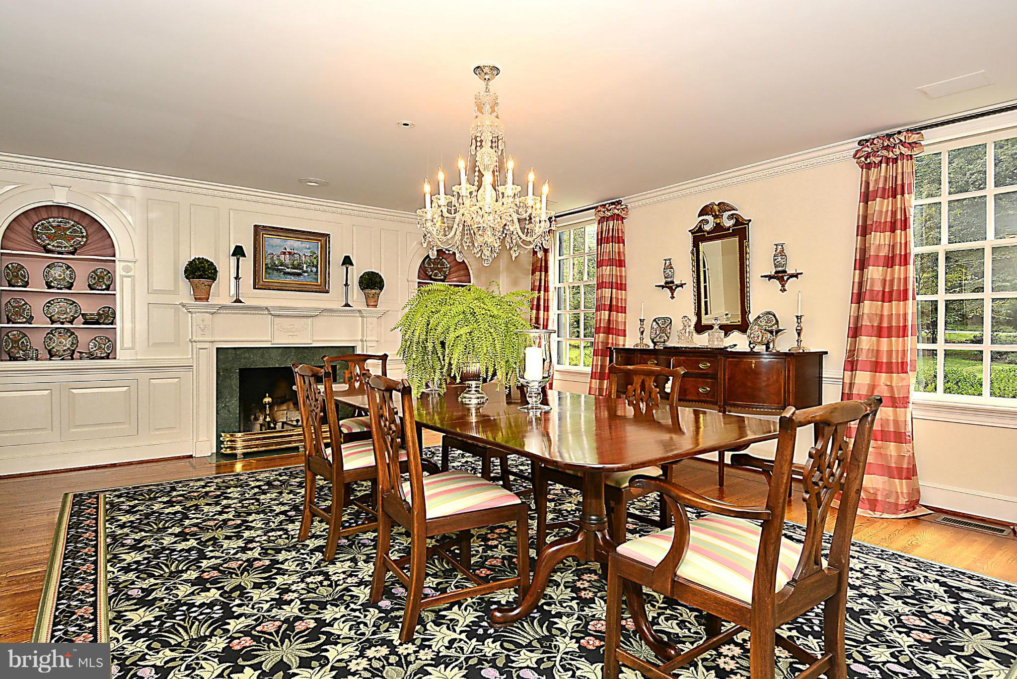 8741 Persimmon Tree Road Potomac, MD 20854 - Photo 10 of 30 Formal dining room w/ raised panel built-ins & FP
