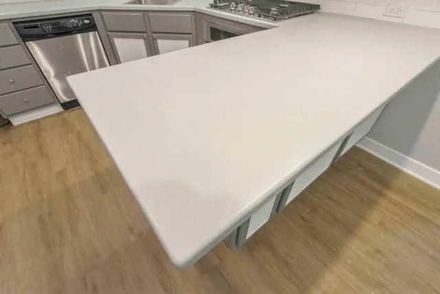 a view of balcony with wooden floor