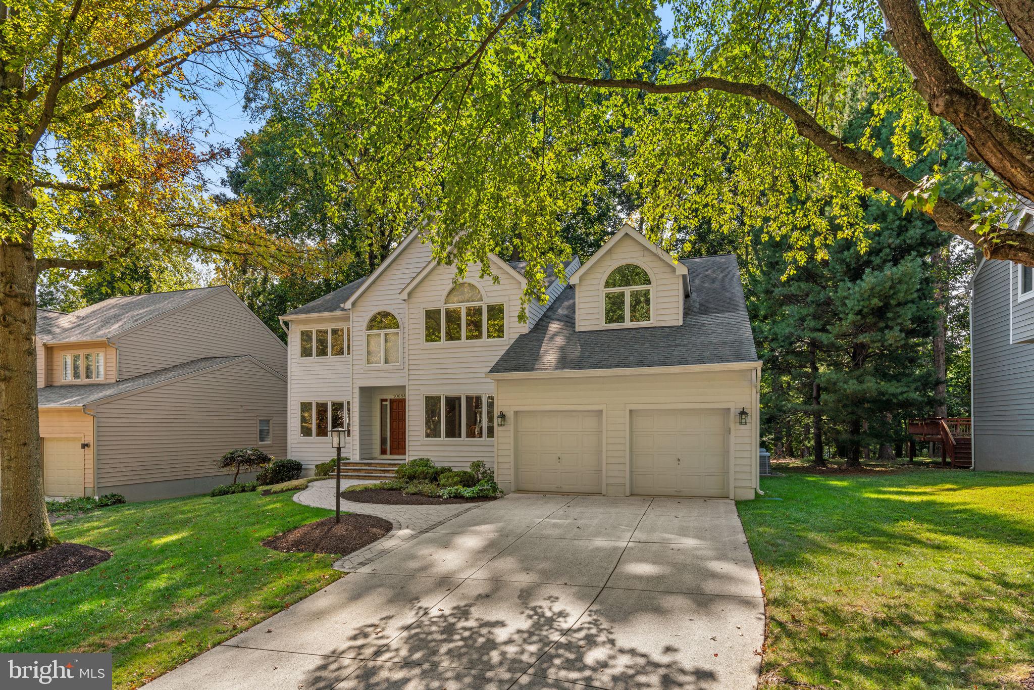 10684 Quarterstaff Road Columbia, MD 21044 - Photo 3 of 84 Plenty of parking in the 2 car garage & driveway